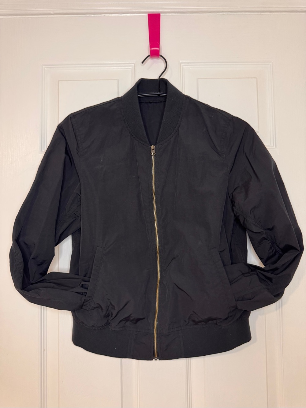 Uniqlo Black Bomber Jacket with Gold Zipper